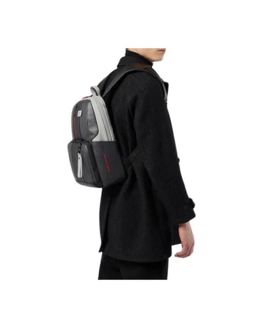 Piquadro Blue Backpacks