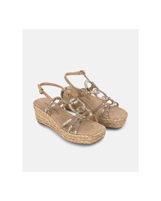 Alma En Pena. Metallic Wedges