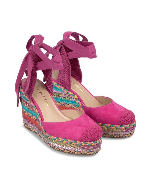 Alma En Pena. Purple Wedges