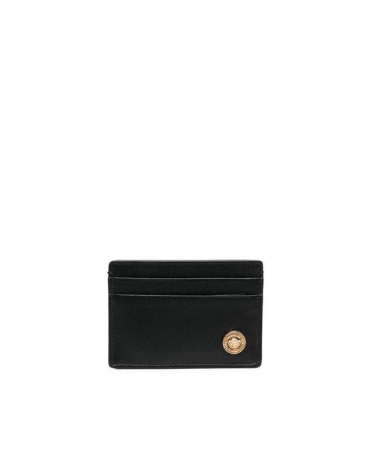 Portafoglio nero con logo in tonalità oro di Versace in Black da Uomo