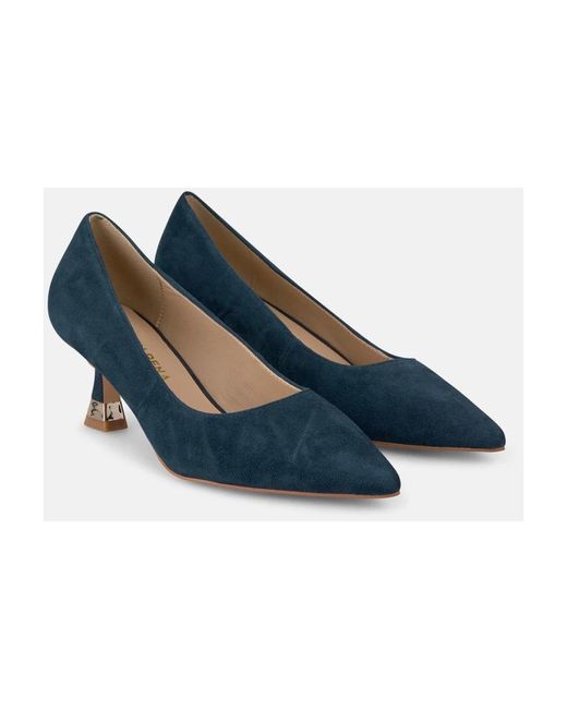 Alma En Pena. Blue Pumps