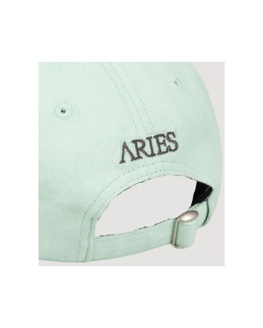 Caps di Aries in Green