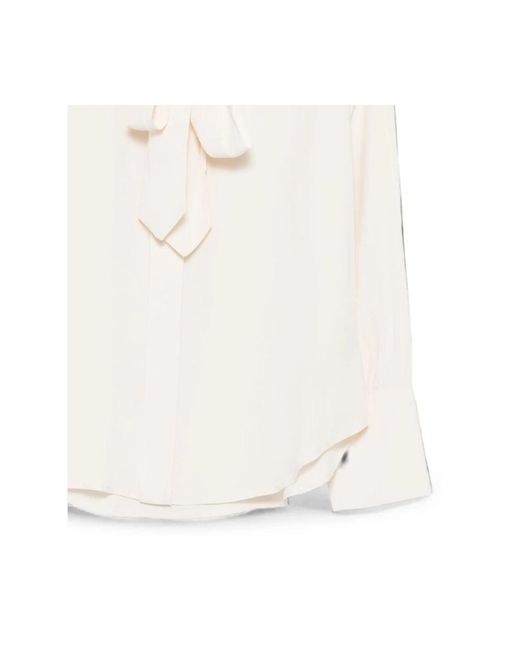 Seventy White Shirts