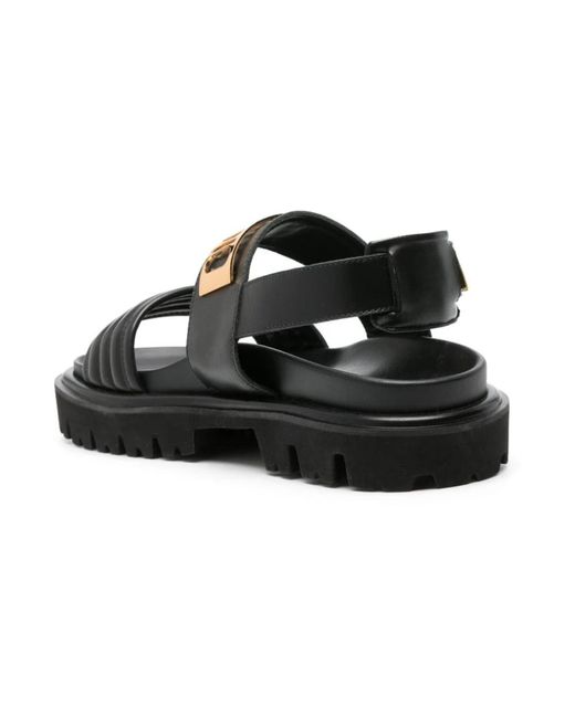 Moschino Schwarze gesteppte sandalen mit goldenem logo in Black für Herren