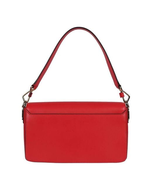Handbags Lancel de color Red