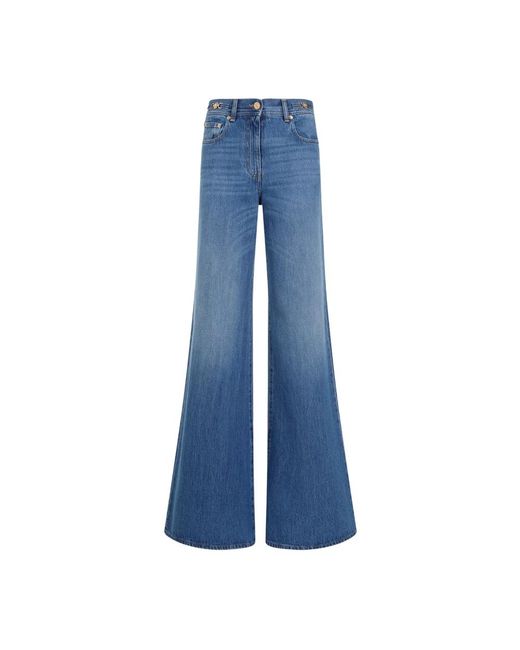 Flared jeans Versace de color Blue