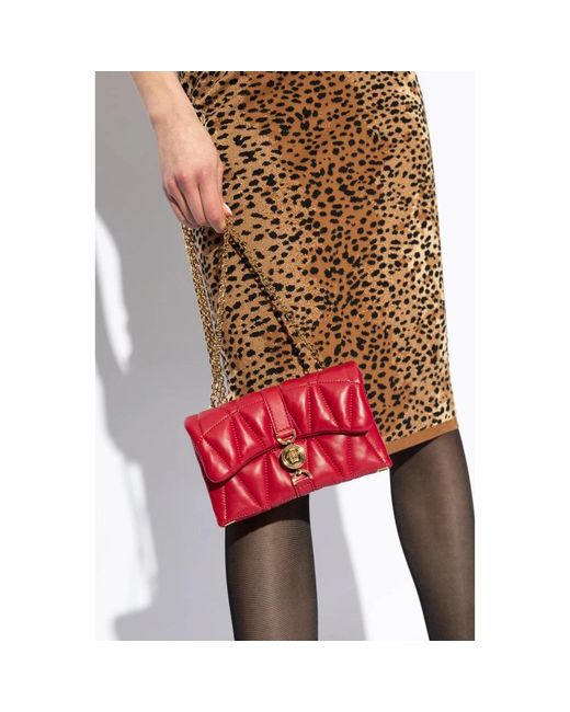 Shoulder Bags di Versace in Red