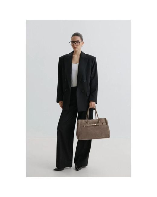 Handbags di ESTRO in Brown