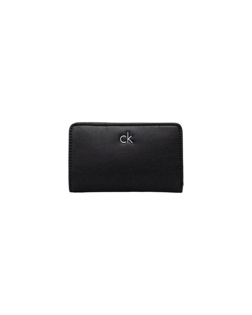 Wallets & Cardholders Calvin Klein de color Black