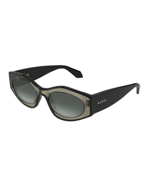 Sunglasses di Alaïa in Black