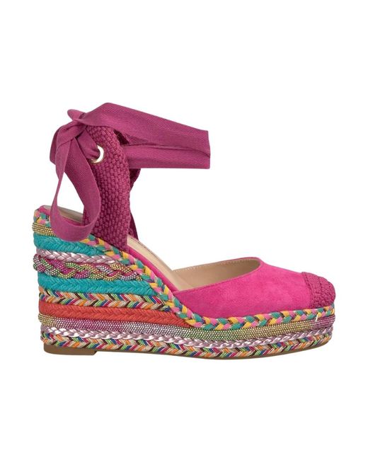 Alma En Pena. Purple Wedges