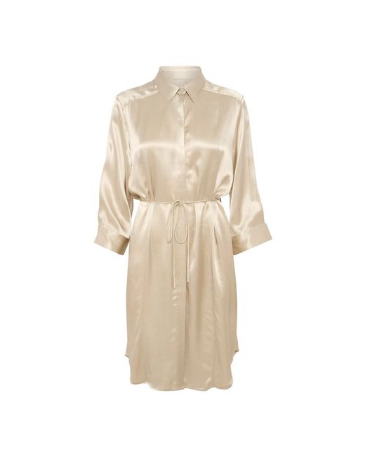 Soaked In Luxury Natural Shirt Dresses
