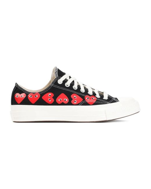 Sneakers basse con stampa cuore di COMME DES GARÇONS PLAY in Red