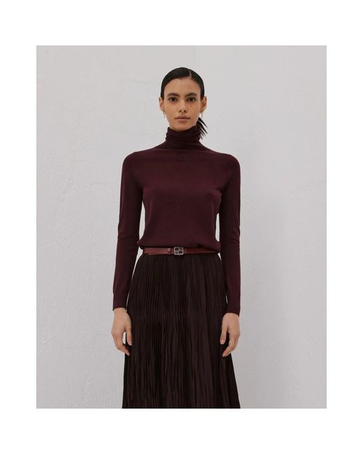 Beatrice B. Purple Turtlenecks