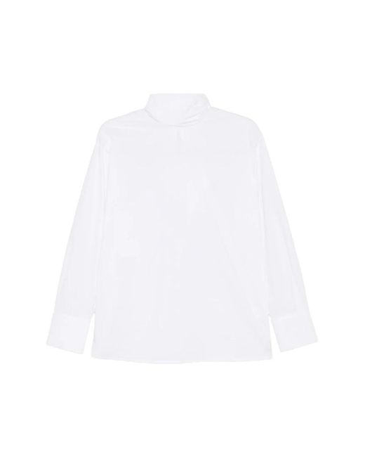 THE NINA STUDIO White Blouses