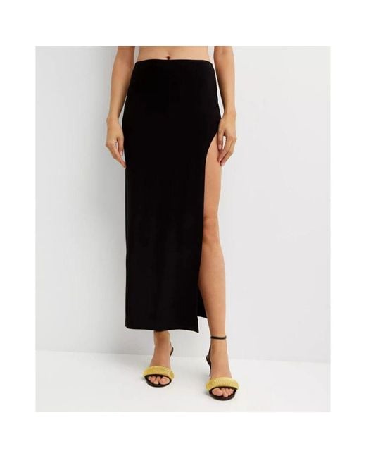 Maxi Skirts di Norma Kamali in Black