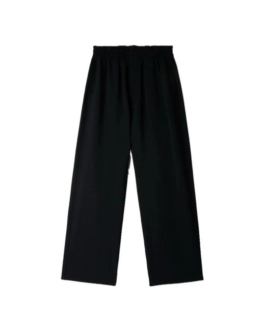 Pantaloni neri elasticizzati regular fit di Sunnei in Black da Uomo