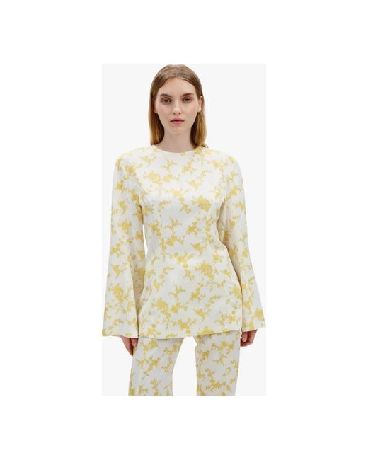 Blouses di BITE STUDIOS in Yellow