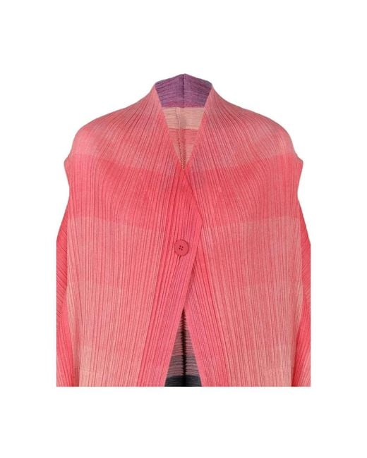 Issey Miyake Red Ponchos