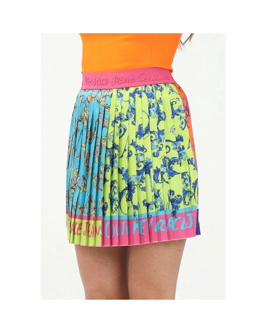 Short Skirts Versace Jeans Couture de color Green