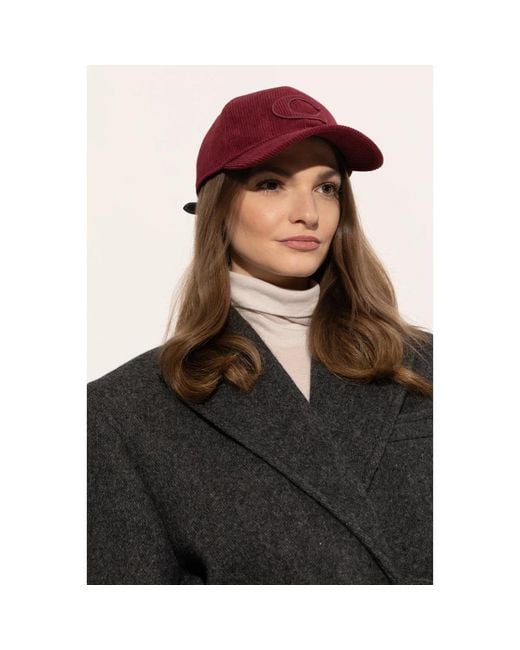 Caps di COACH in Red