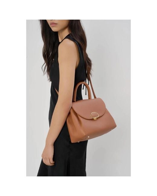 Handbags di Lancaster in Brown