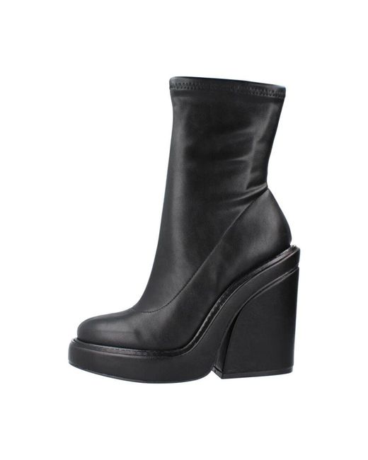 Steve Madden Black Heeled boots,pumps