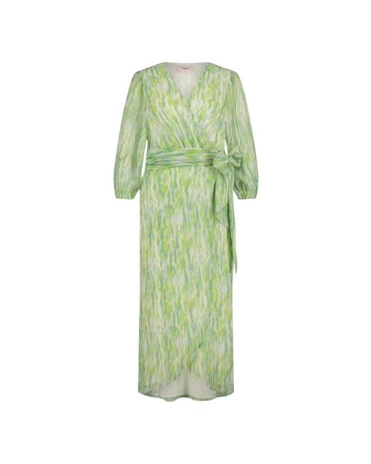 Freebird by Steven Green Wrap Dresses