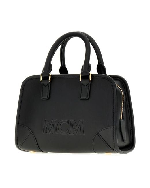 Handbags MCM en coloris Black