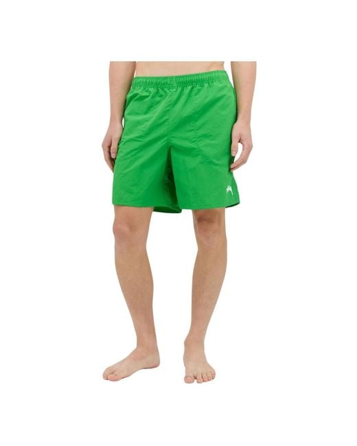 Nylon logo print swim shorts di Stussy in Green da Uomo