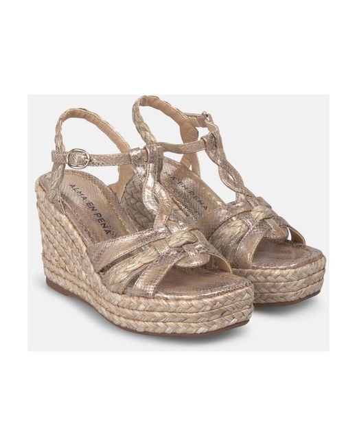 Alma En Pena. Metallic Wedges