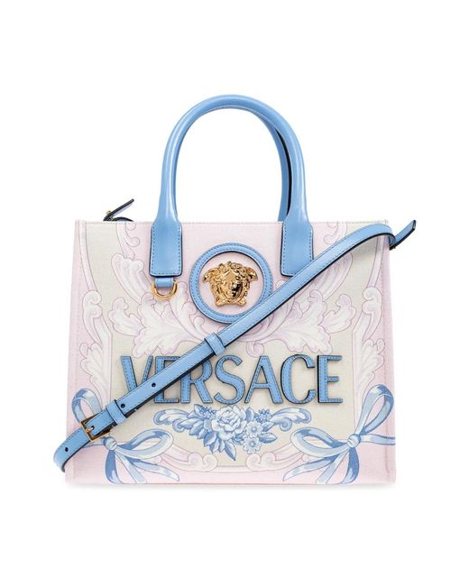 Piccola borsa shopper con medusa di Versace in Blue