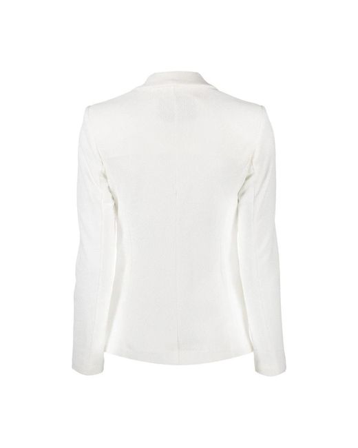 Seventy White Blazers