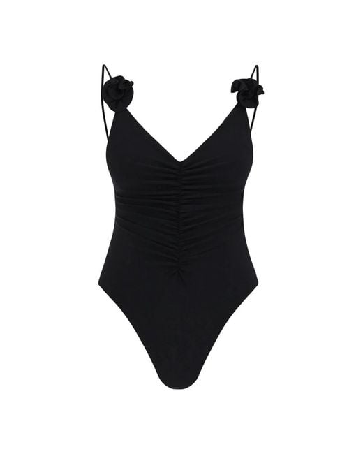 Rose applique deep v-neck swimsuit di Magda Butrym in Black