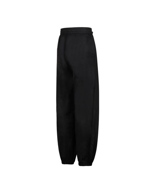 Trousers > sweatpants J.W. Anderson pour homme en coloris Black