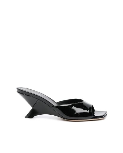 Scarpe basse tacchi mules sandalo piuma di Vic Matié in Black