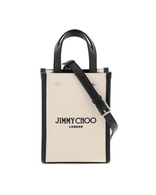 Mini borsa in pelle con logo contrasto e borchie di Jimmy Choo in Natural