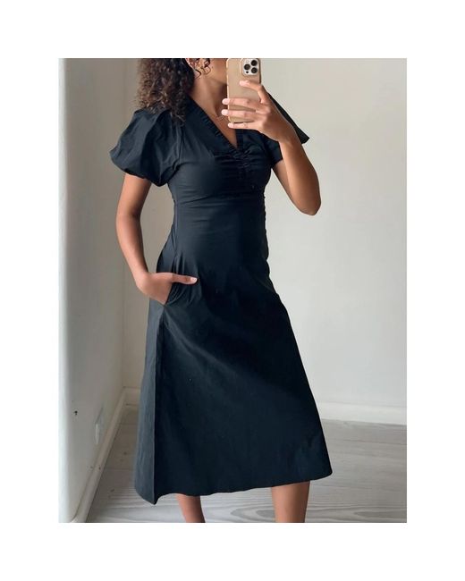 Neo Noir Black Midi dresses