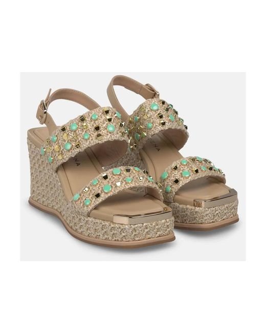Alma En Pena. Metallic Wedges