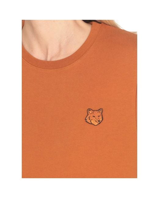 Maison Kitsuné Orange Braunes baumwoll-t-shirt mit logo-patch