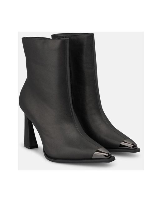 Alma En Pena. Black Heeled Boots