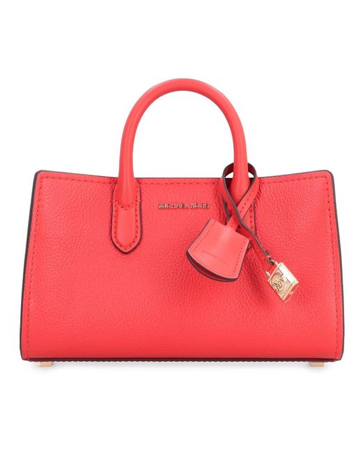 Handbags di Michael Kors in Red