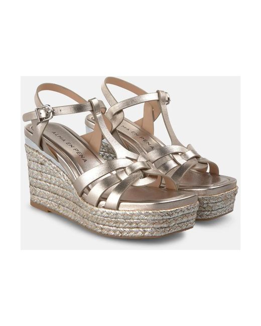 Alma En Pena. Metallic Wedges
