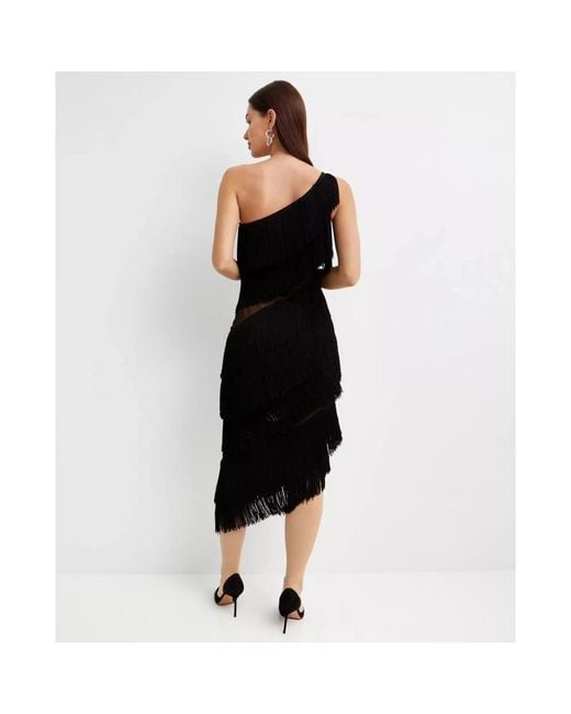 Norma Kamali Black Midi Dresses