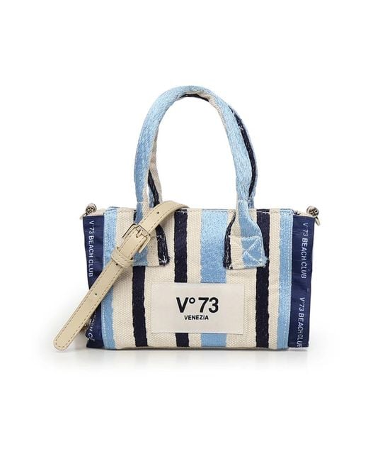 V73 Blue Tote Bags