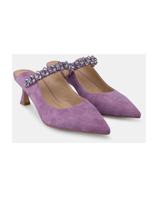 Alma En Pena. Purple Heeled Mules