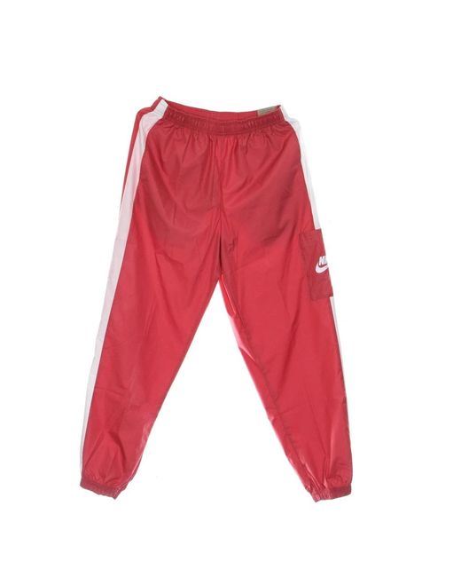 Nike Fitness ,Roze ,Polyester Essentiële Geweven Jogger Trainingsbroek Roze/Wit in het Red