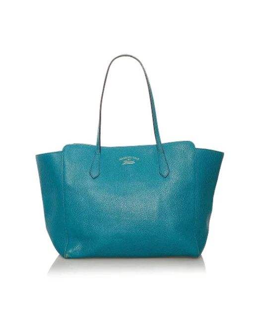 Borsa tote swing in pelle blu usata di Gucci in Blu | Lyst