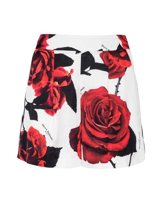 Shorts de satén con estampado de rosas rojas Balmain de color Red