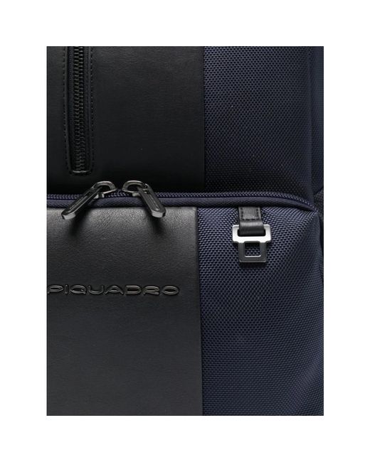 Piquadro Blue Backpacks